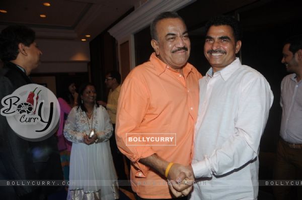Shivaji Satam poses with a friend at IMFAA