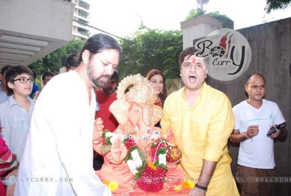 Goldie Behl holding the Ganesha idol for the Visarjan
