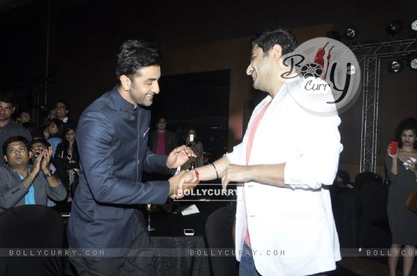 Ranbir Kapoor greets DJ Khushi at the Success Bash of Saavn Mobile App