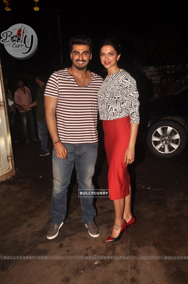 Arjun Kapoor and Deepika Padukone pose for the media at the Screening for Finding Fanny (335697)