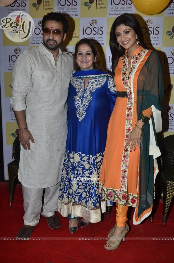 Shilpa Shetty and Raj Kundra pose with a guest at the Promotion of Iosis Medi Spa