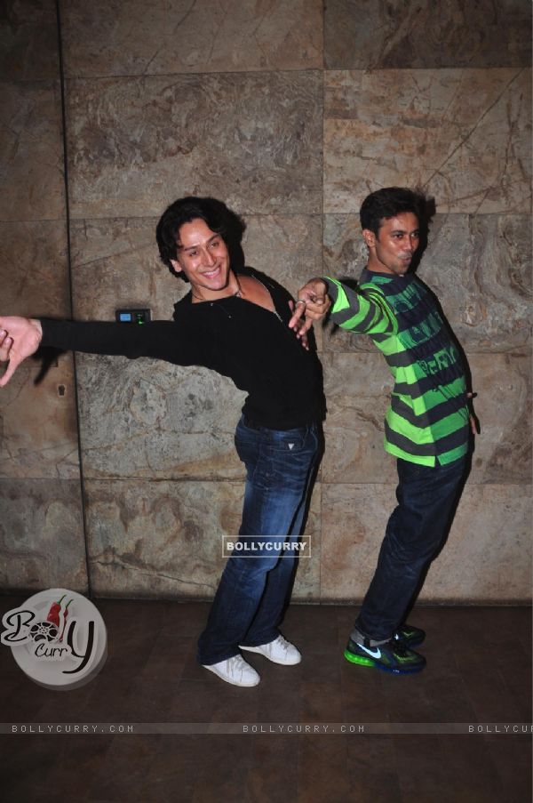 Tiger Shroff shakes a leg with a friend at the Launch of his New Video