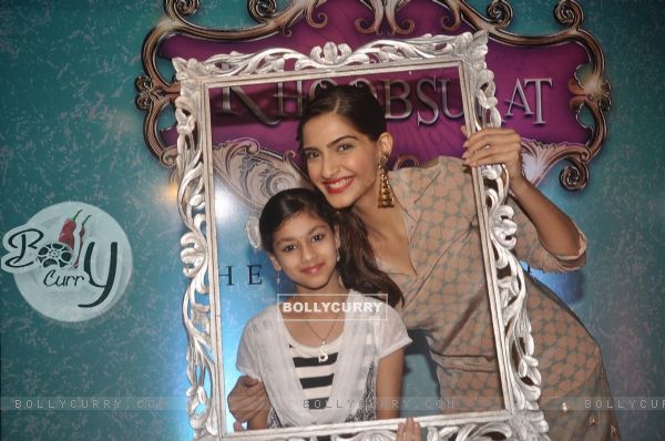 Sonam Kapoor poses with a fan at the Promotions of Khoobsurat at Viviana Mall, Thane (336284)