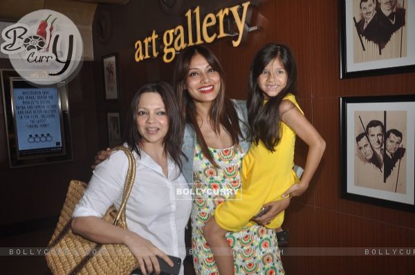 Bipasha Basu poses with a friend and a kid at the Special Screening of Creature 3D