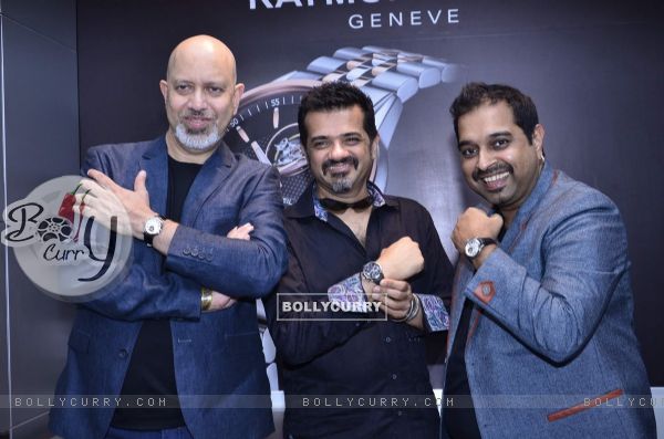 Shankar, Ehsaan and Loy pose with watches at the Launch of Raymond Weil Store