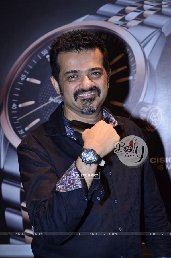 Ehsaan Noorani pose with a watch at the Launch of Raymond Weil Store