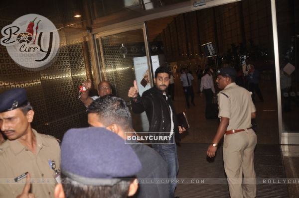 Abhishek Bachchan waves to the fans at Airport