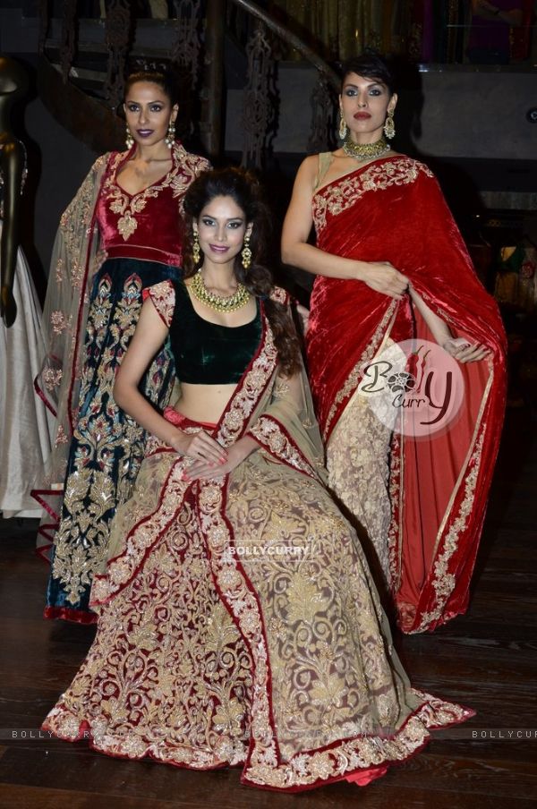 Models showcase the designs at the Store Launch of Shyamal Bhumika