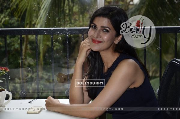 Nimrat Kaur gives a smiling pose for the camera at the Launch of Juice Magazine
