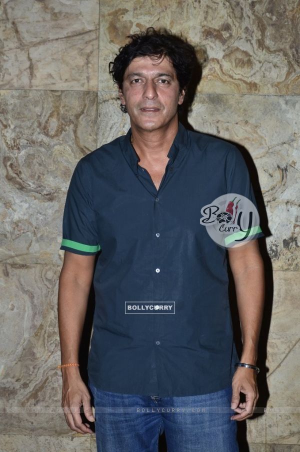 Chunky Pandey poses for the media at the Special Screening of Khoobsurat