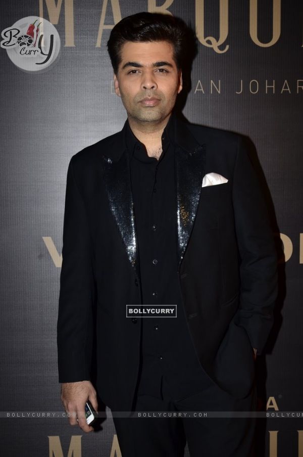 Karan Johar poses for the media at the Launch of Vero Moda MARQUEE Collection