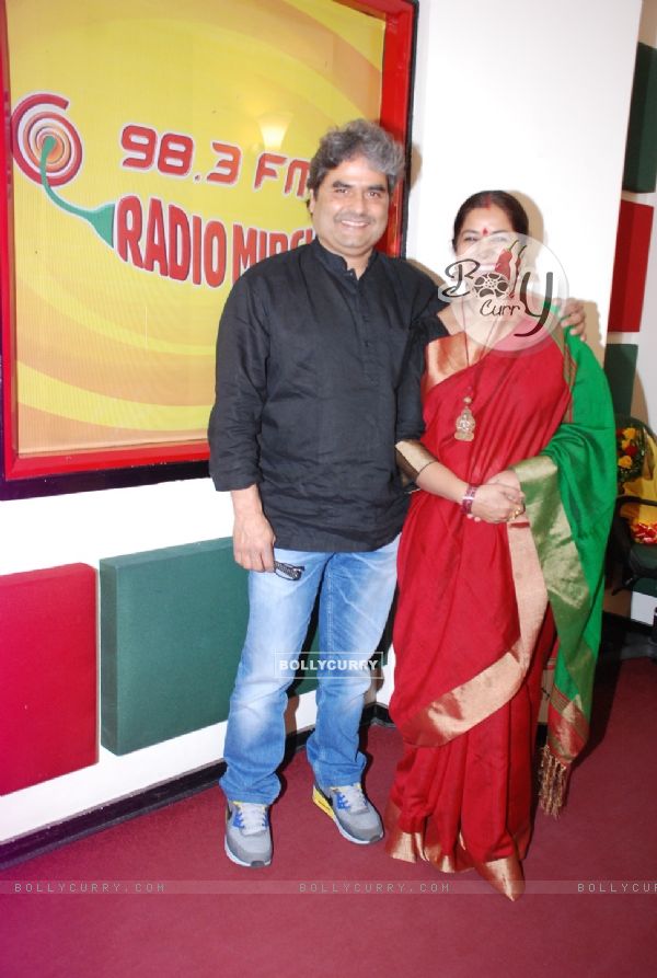 Vishal Bharadwaj and Rekha Bharadwaj pose for the media at Radio Mirchi Studio