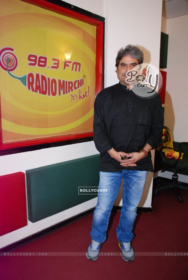 Vishal Bharadwaj poses for the media at Radio Mirchi Studio