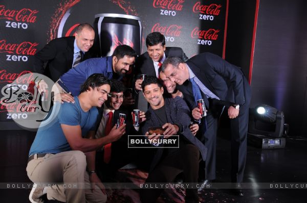 Farhan Akhtar clicks a selfie at the Launch of Coke Zero in India