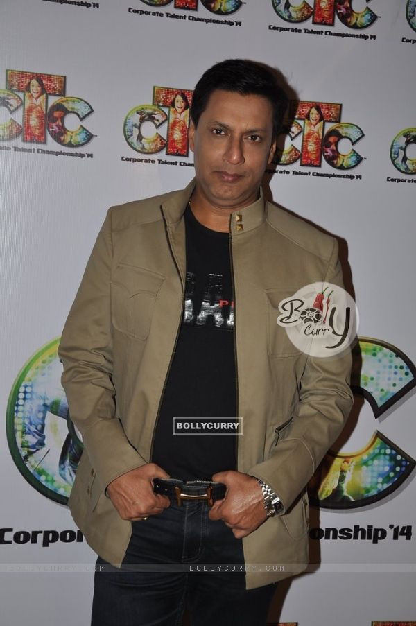 Madhur Bhandarkar poses for the media at Corporate Competition