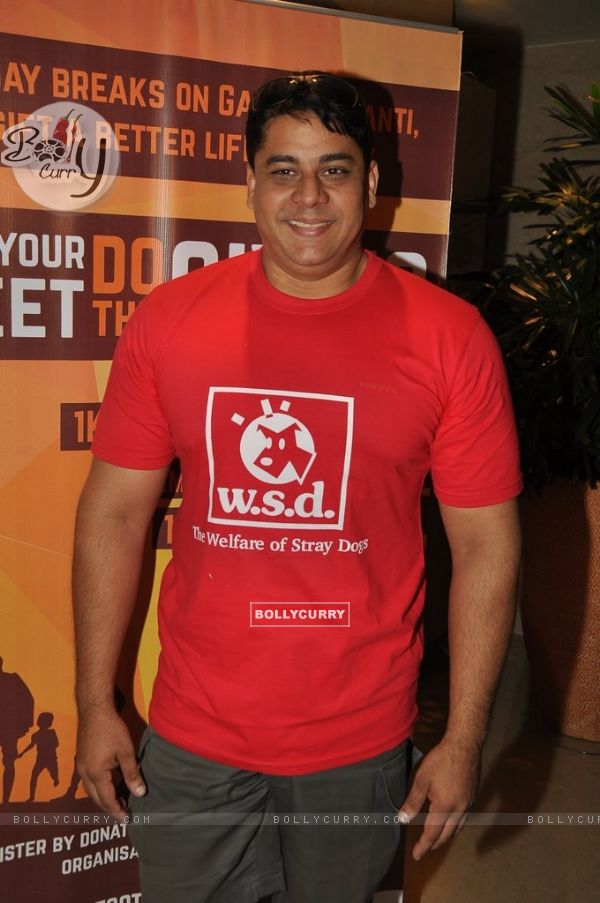 Cyrus Broacha poses for the media at Footsteps 4 Good Ngo Event