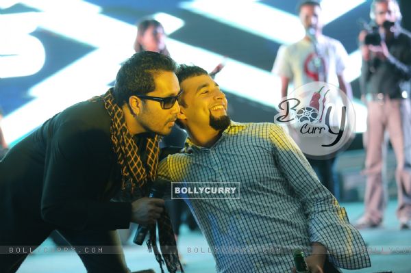 A fan clicks a picture with Mika Singh as Bindass Celebrates 7th Anniversary