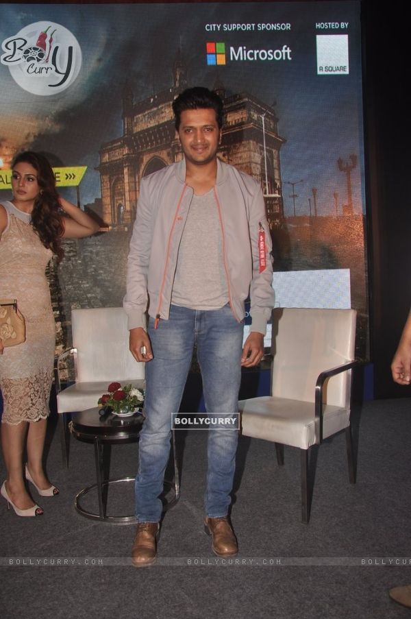 Riteish Deshmukh poses for the media at Social Media for Change Event