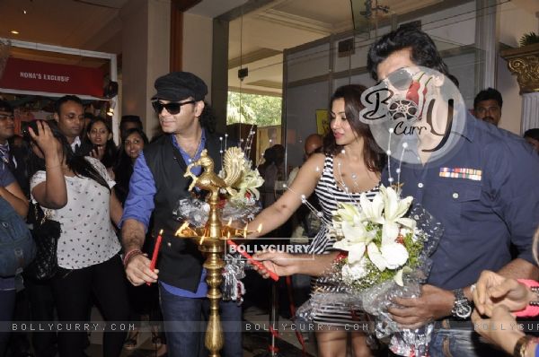 Mohit Chauhan and Nikhil Dwivedi light the lamp at the Launch of Times Glitter