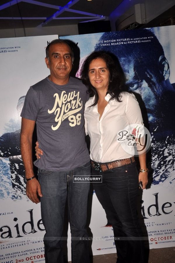 Milan Luthria poses with wife at the Special Screening of Haider (339208)