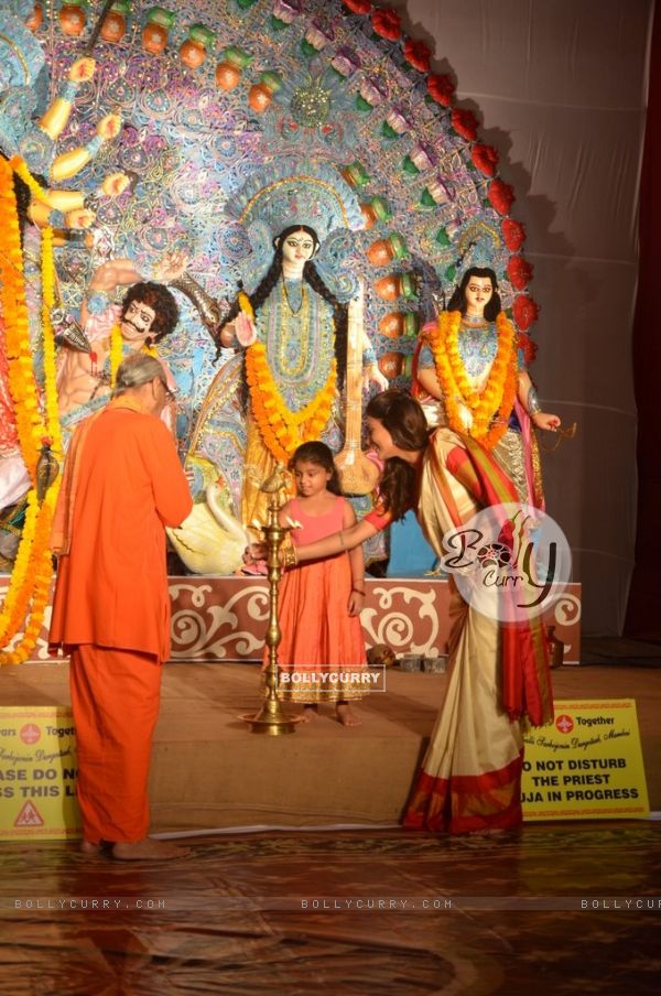 Sushmita Sen lighting the lamp at Durga Pooja