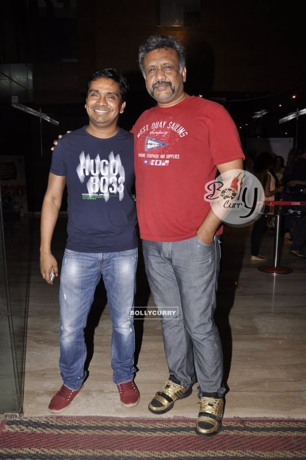 Anubhav Sinha poses with a friend at the Special Screening of Haider hosted by Tabu