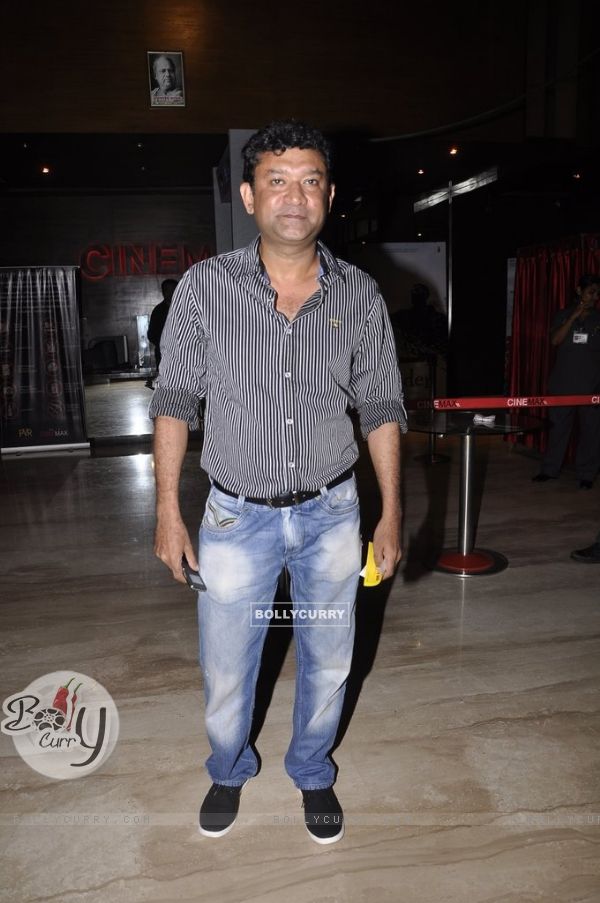 Ken Ghosh poses for the media at the Special Screening of Haider hosted by Tabu