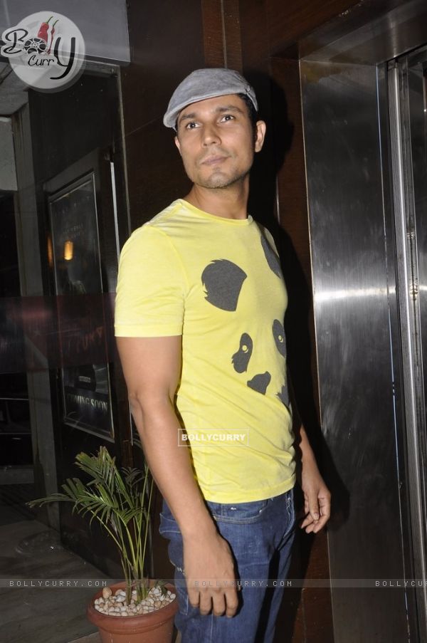 Randeep Hooda poses for the media at the Special Screening of Haider hosted by Tabu