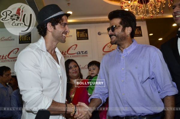 Hrithik Roshan and Anil Kapoor greet each other at the Criticare Hospital Launch