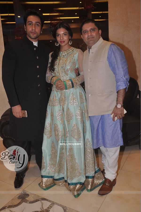 Adhyayan Suman poses with Sara Loren and a guest at the Annual Garba Celebrations