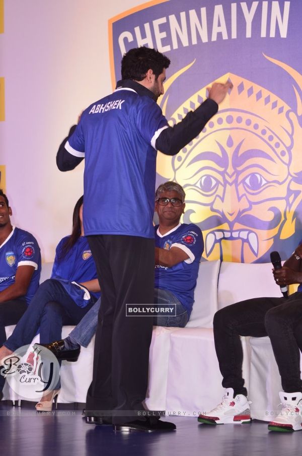 Abhishek Bachchan poses with his jersey at the ISL Chennai FC team launch