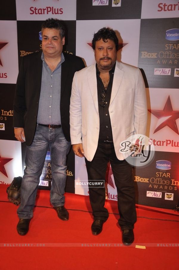 Tigmanshu Dhulia poses with a friend at Star Box Office Awards