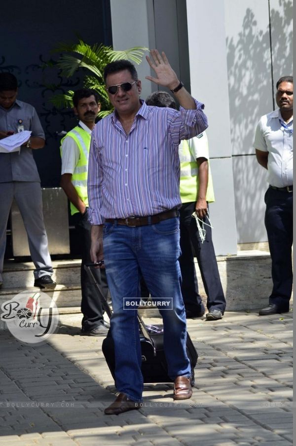 Boman Irani poses for the media at Airport while leaving for Ahmedabad
