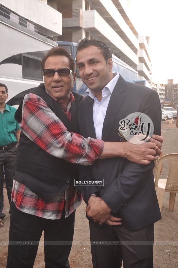 Dharmendra Singh Deol poses with a friend at the Music Launch of Badlapur Boys
