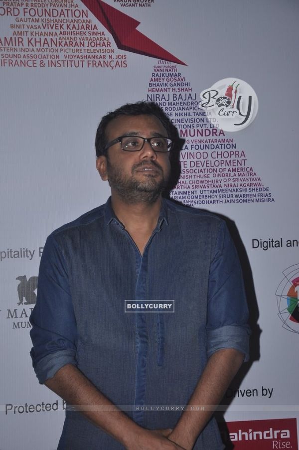 Dibakar Banerjee poses for the media at the 16th MAMI Film Festival Day 3