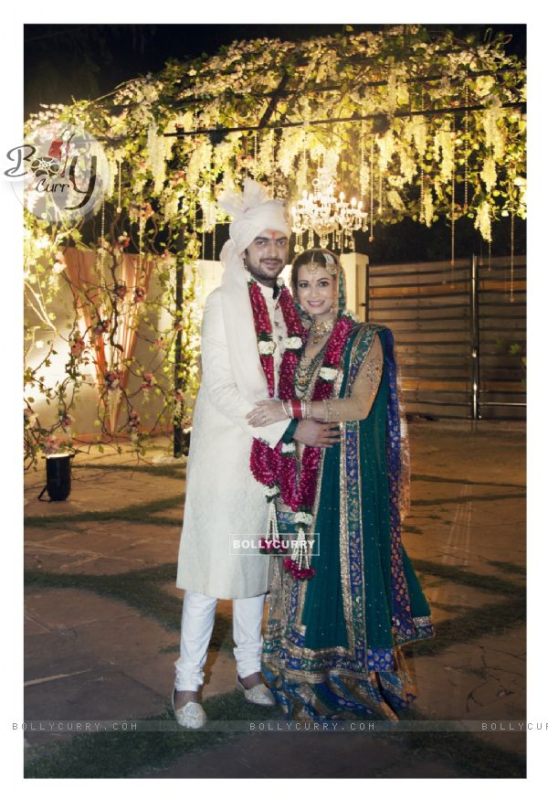 Dia Mirza and Sahil Sangha poses for the media post their wedding