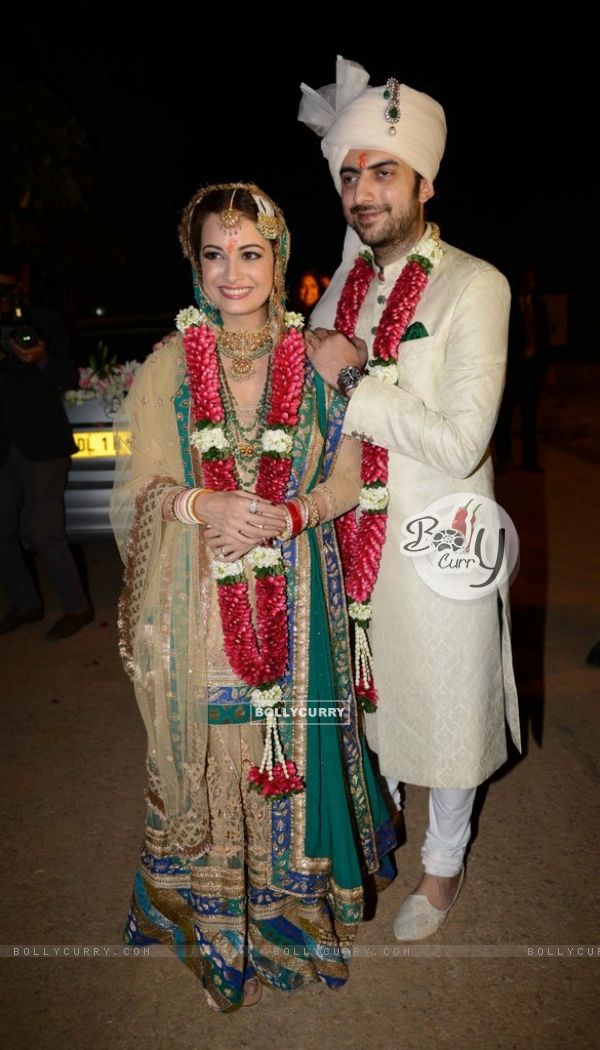 Dia Mirza and Sahil Sangha pose for the media at their Wedding Ceremony