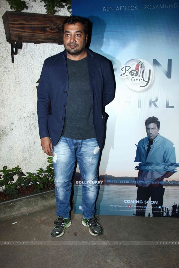 Anurag Kashyap poses for the media at the Special Screening of Ben Affleck's Gone Girl