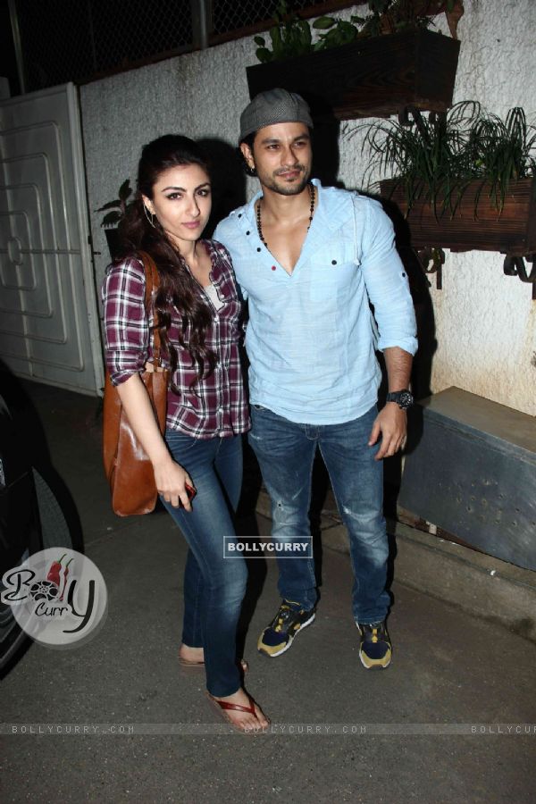 Kunal Khemu and Soha Ali Khan pose for the media at the Special Screening of Ben Affleck's Gone Girl