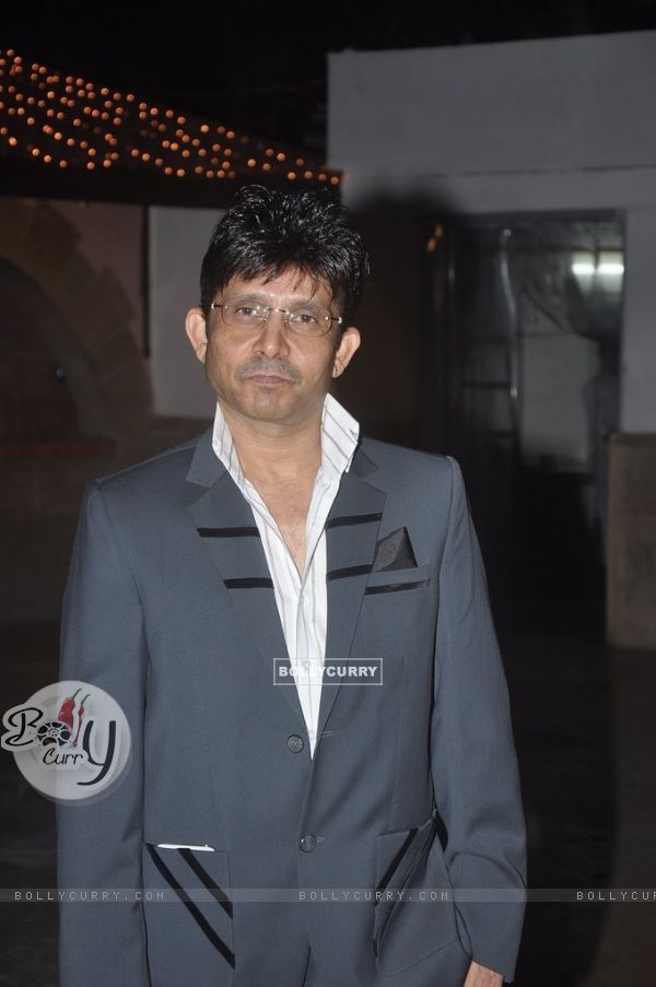Kamal R Khan poses for the media at the Launch of his Box Office Website