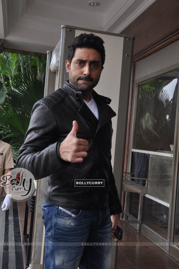 Abhishek Bachchan poses for the media at Happy New Year Game Launch
