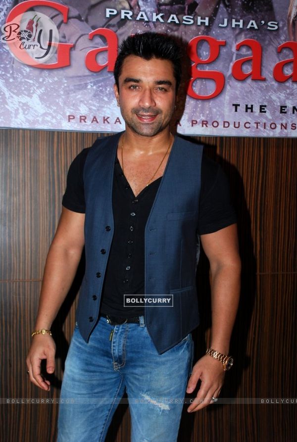 Ajaz Khan poses for the media at the Launch of Rajneeti 2