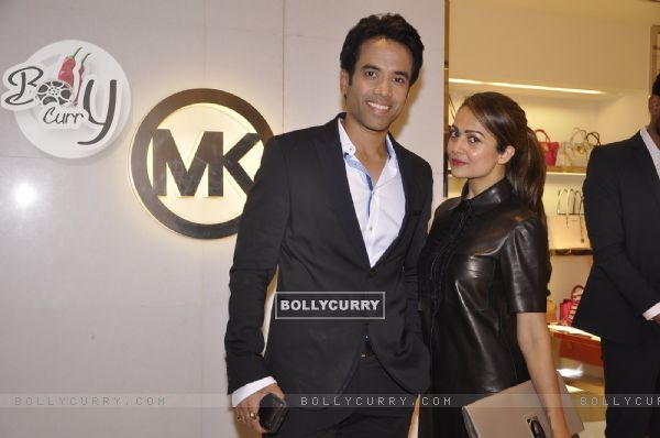 Amrita Arora poses with Tusshar Kapoor at Michael Korrs Store Launch
