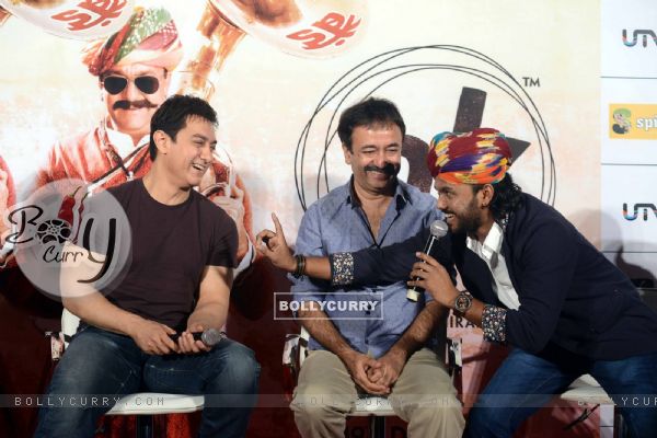 Aamir Khan interacts with the singer at the Song Launch of P.K. (344001)