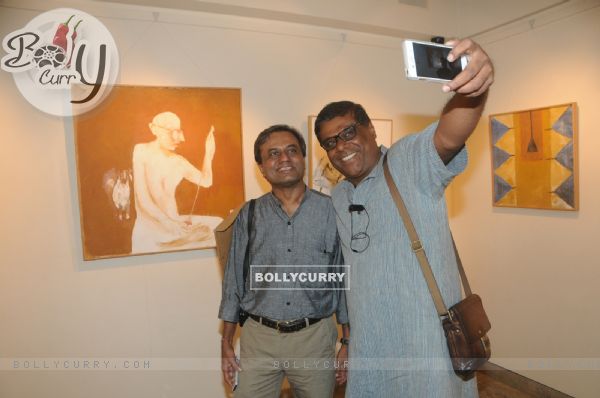 Ashish Vidyarthi clicks a selfie with a friend at the Inauguration of a Special Art Exhibition