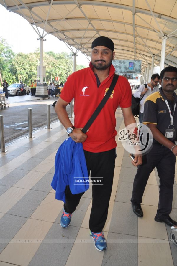 Indian Cricketer Harbhajan Singh poses for the media at Airport