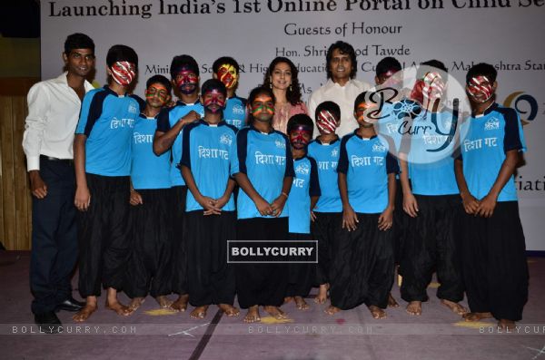 Juhi Chawla poses with children at the Launch of aarambhindia.org