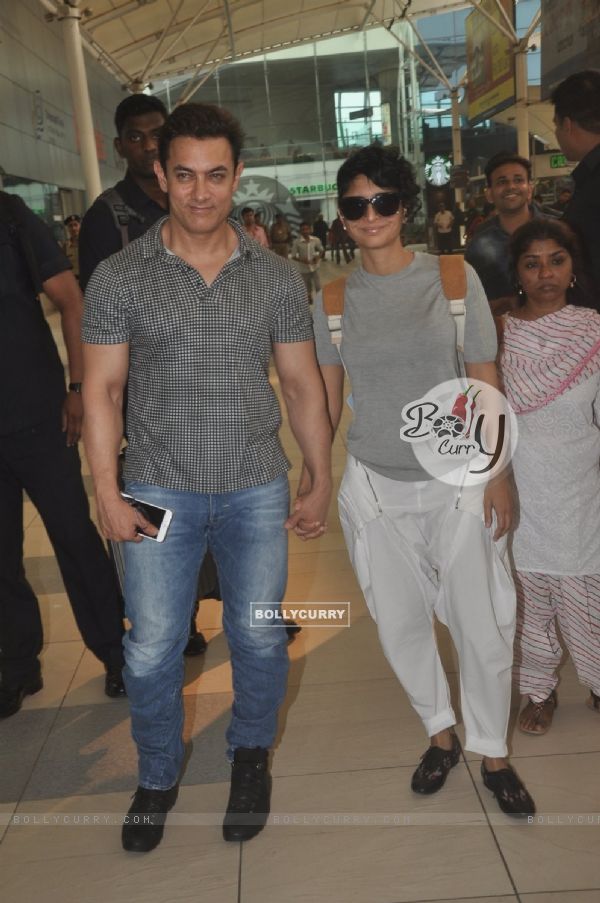Aamir Khan and Kiran Rao snapped at airport while returning from Arpita Khan's Wedding