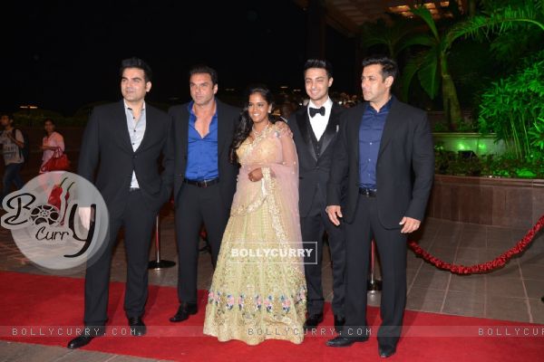 Arpita and Aayush pose with the Khan Brothers at their Wedding Reception