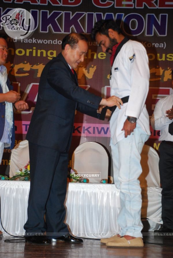 Ajay Devgn felicitated with a black belt by Taekwondo Masters from Korea (345894)